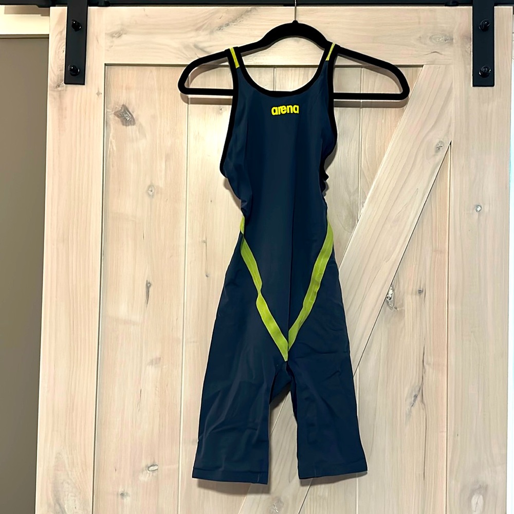 Arena Tech Suit, size 30.  Color is charcoal with yellow accents.